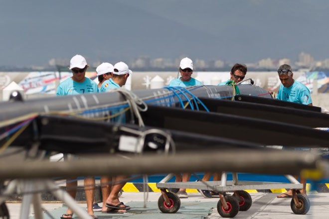 Team Telefonica change their rigging, prior to the start of the Sanya Haitang Bay In Port Race - Volvo Ocean Race 2011-12 © Ian Roman/Volvo Ocean Race http://www.volvooceanrace.com